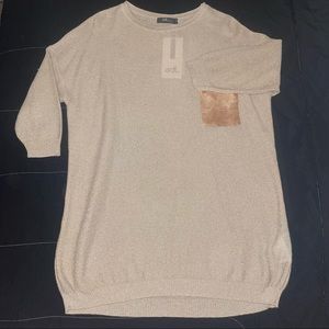 Woman’s gold blouse brand new size small